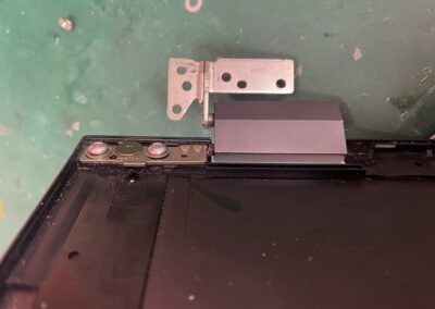 Identifying broken hinge area before repair - CPRepairs Lab