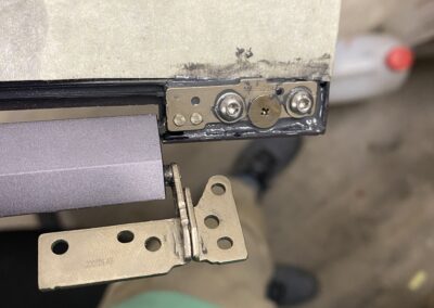 Hinge bracket repaired with screws and epoxy - CPRepairs Lab